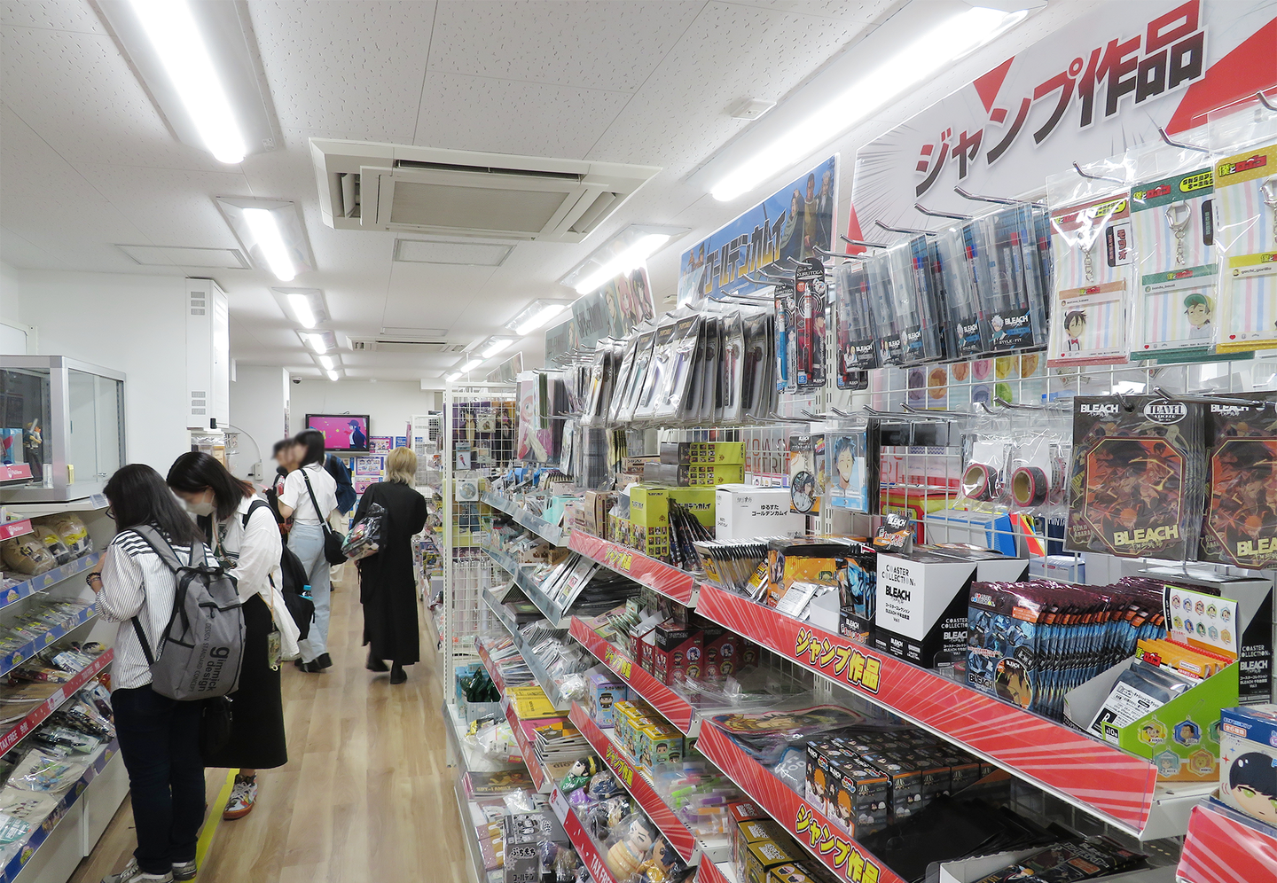 Interior view of Animate Akihabara store showcasing anime merchandise displays
