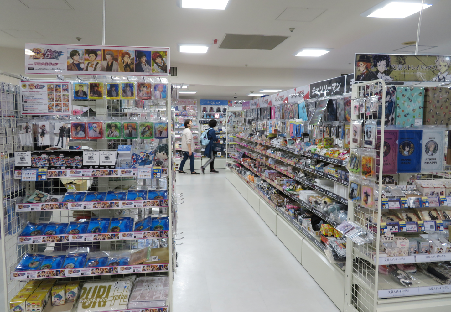Interior of Animate Shinjuku store displaying anime merchandise and products